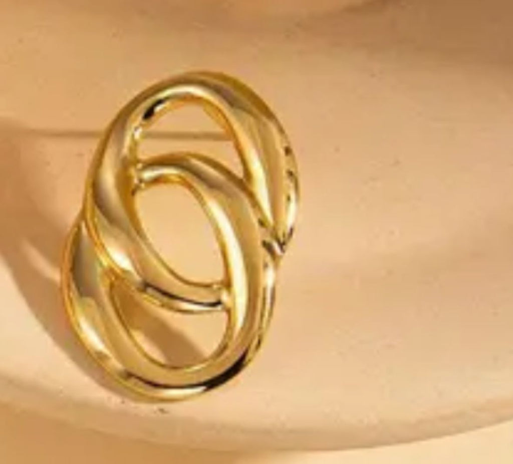 Double loop “S” shaped ring