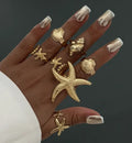 Sea radiant imitation gold luxe statement ring set.