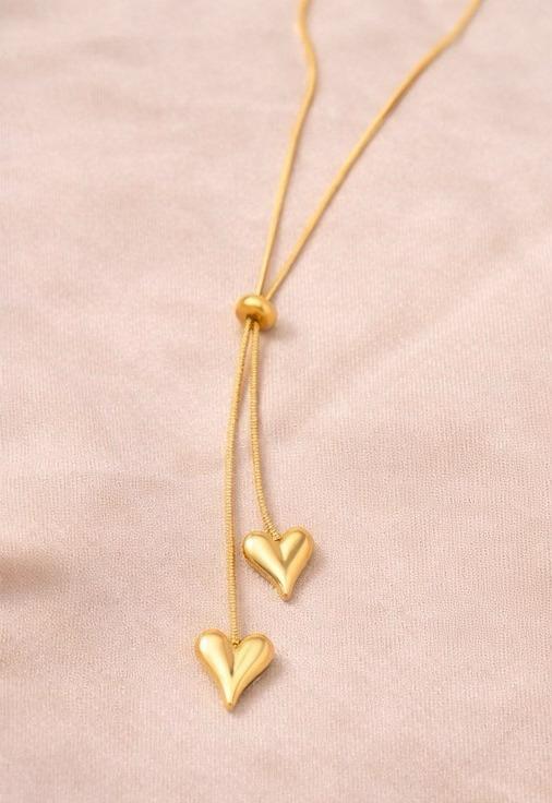 Twin heart drop pendant