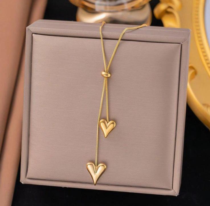 Twin heart drop pendant